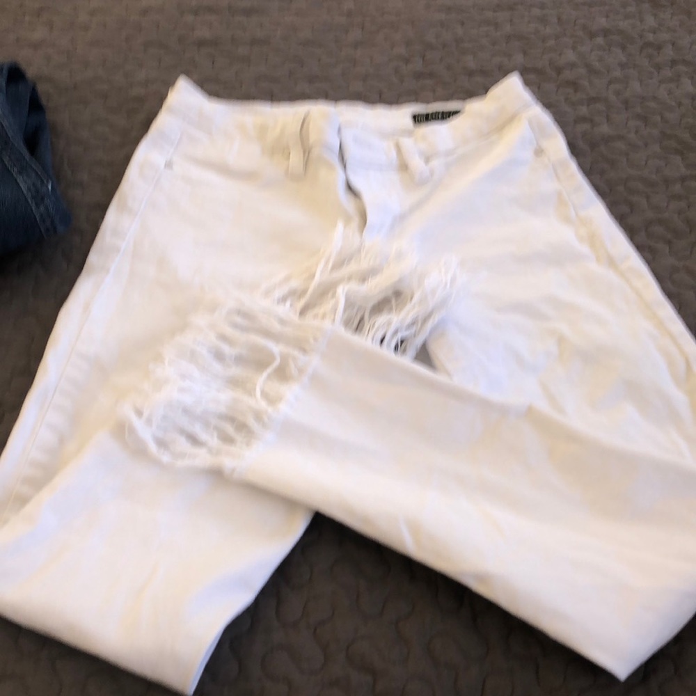 White fringed bottom BlankNYC white jeans.